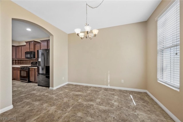 interior space with a chandelier