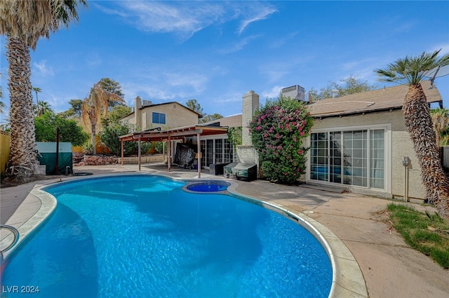 view of swimming pool with a pergola and a patio area