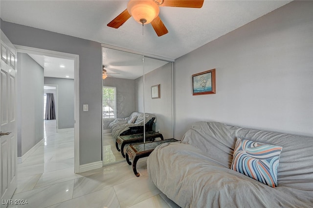 living room featuring ceiling fan