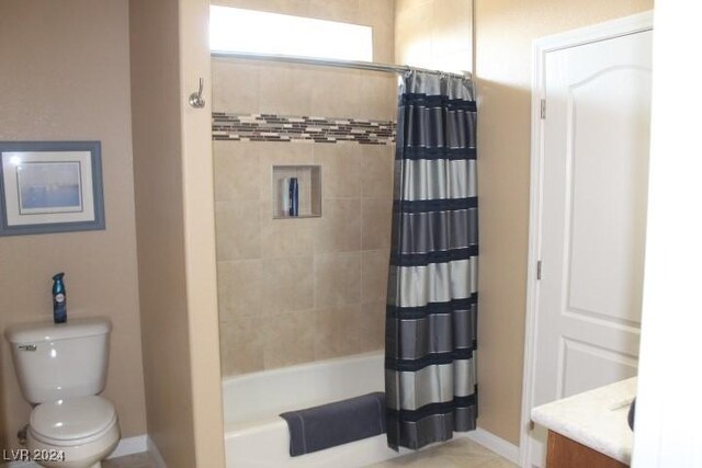 full bathroom featuring vanity, shower / bath combination with curtain, and toilet