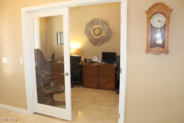 interior space with french doors and light tile patterned floors