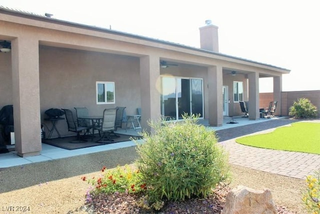 back of house featuring a patio