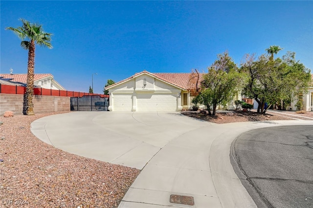 ranch-style home featuring a garage