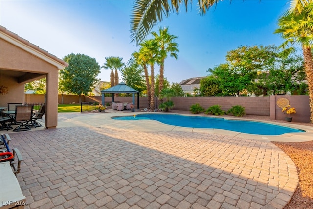 view of pool featuring a gazebo and a patio