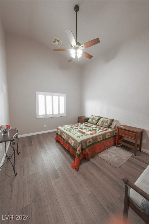 bedroom with hardwood / wood-style flooring and ceiling fan