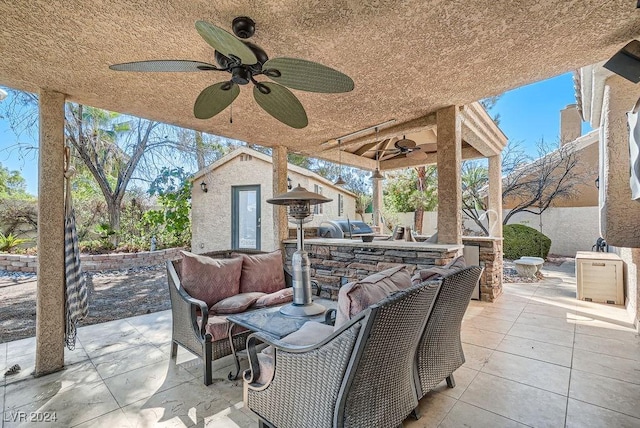 view of patio featuring an outbuilding