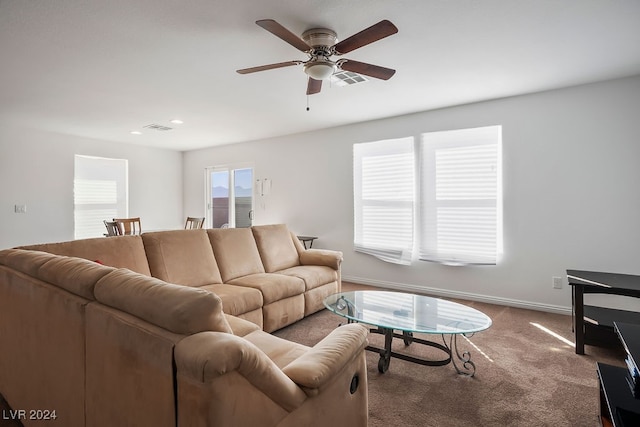 living room with carpet and ceiling fan