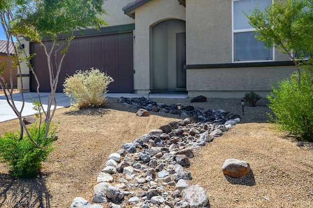 exterior space with a garage