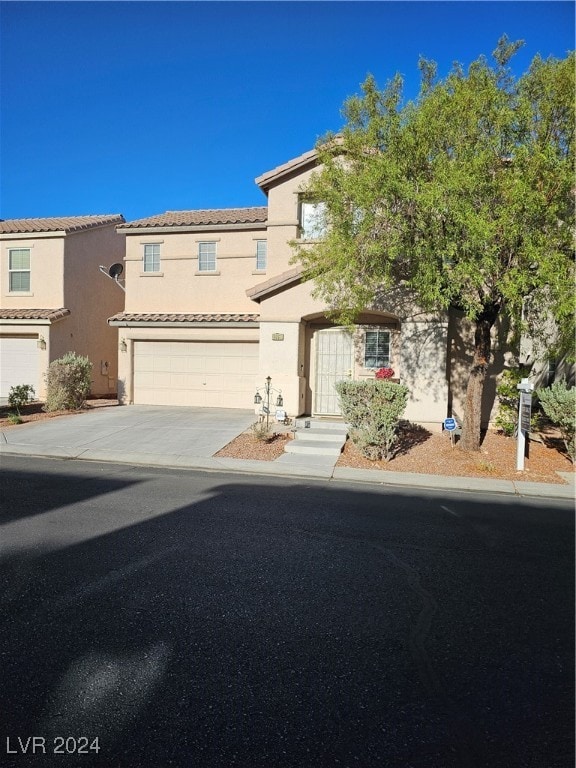 view of front of property with a garage