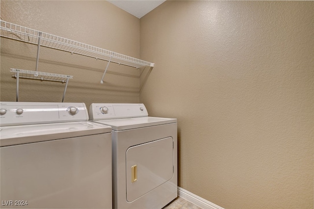 laundry area with separate washer and dryer