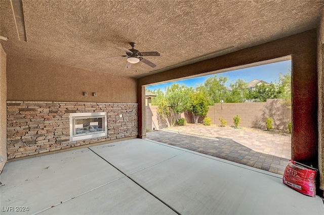 view of patio featuring ceiling fan