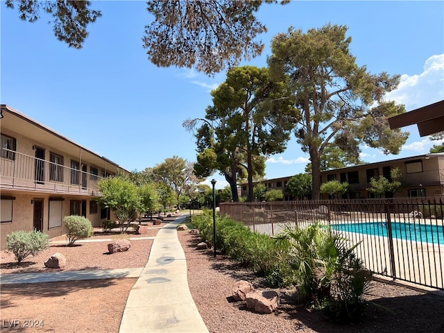 view of home's community with a swimming pool