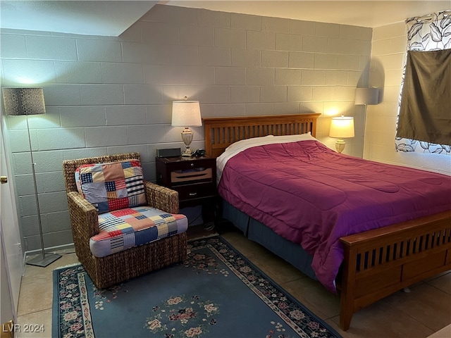 bedroom with tile patterned floors