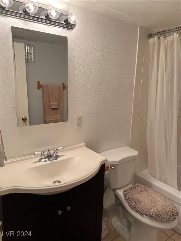 full bathroom with vanity, toilet, shower / bathtub combination with curtain, and tile patterned floors