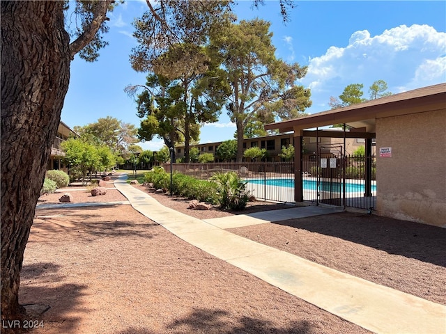 exterior space featuring a patio and a pool