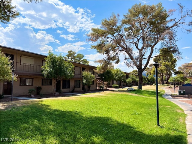 view of community featuring a yard