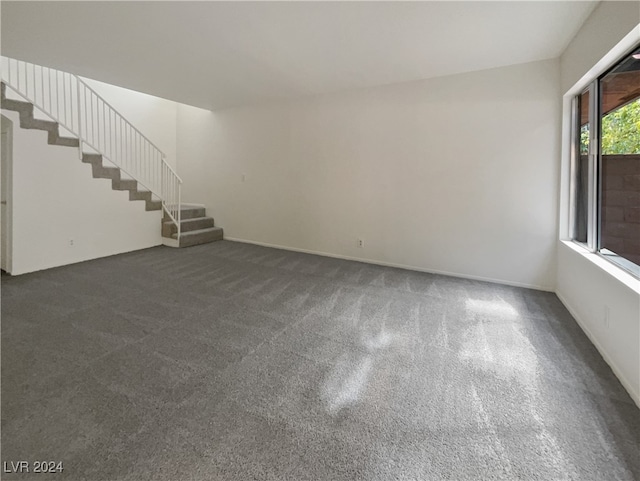 unfurnished living room with carpet floors