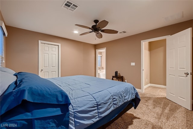 bedroom featuring ceiling fan and light carpet