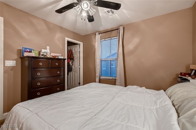 bedroom featuring ceiling fan