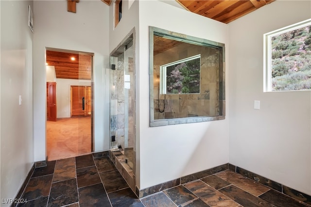 hall featuring wooden ceiling