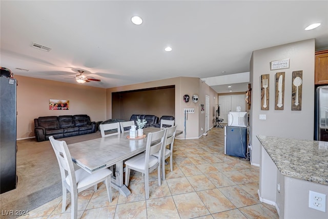 dining room with ceiling fan