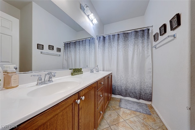 bathroom featuring vanity and tile patterned floors