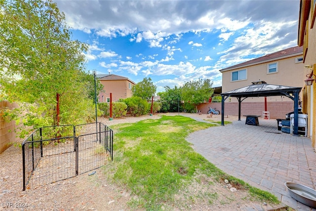 view of yard featuring a patio area and a gazebo