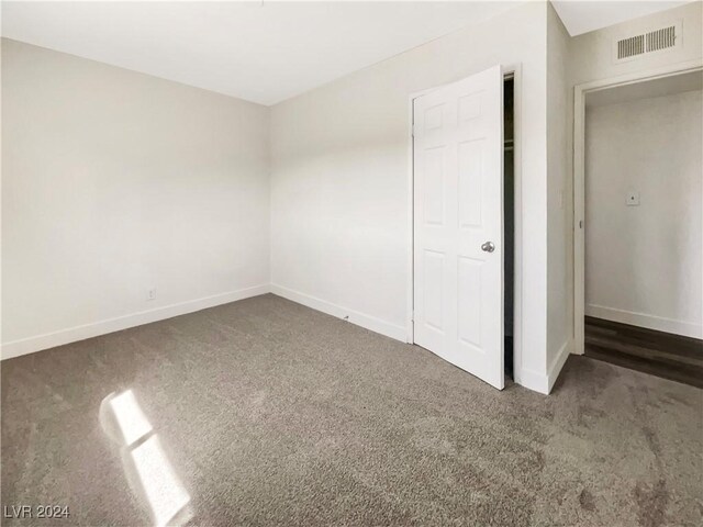 unfurnished bedroom featuring carpet flooring