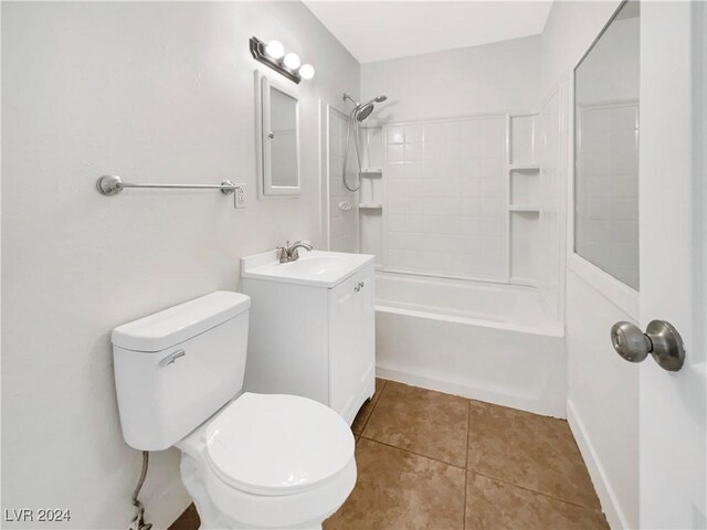 full bathroom featuring vanity, toilet,  shower combination, and tile patterned floors