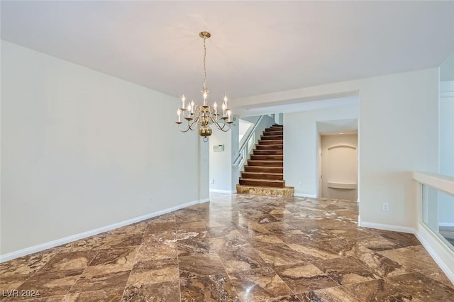 unfurnished dining area with a chandelier