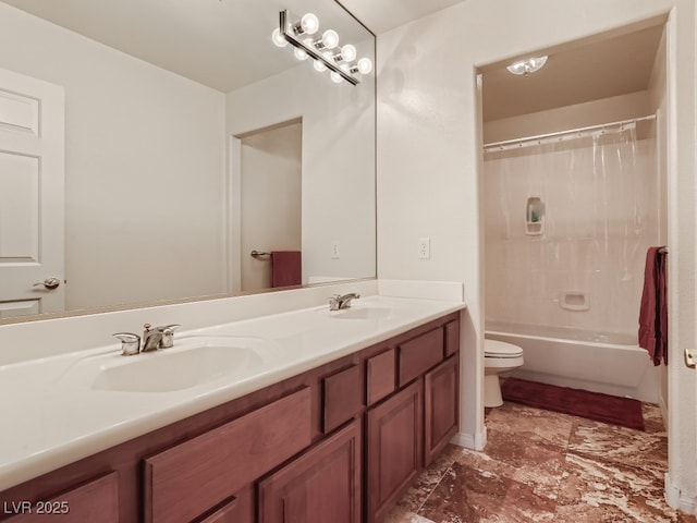 full bathroom featuring shower / bath combo, vanity, and toilet