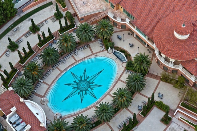 view of swimming pool with a patio area