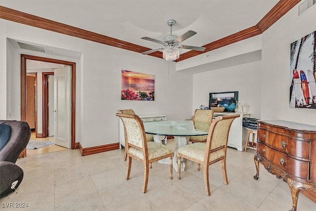 dining area featuring ceiling fan, ornamental molding, and light tile patterned flooring