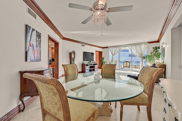 dining space featuring ceiling fan, ornamental molding, and light tile patterned floors