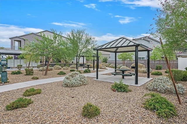 surrounding community featuring a pergola and a gazebo