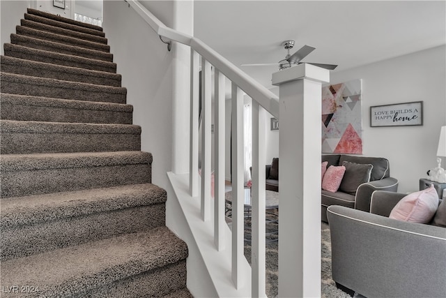 stairs with ceiling fan