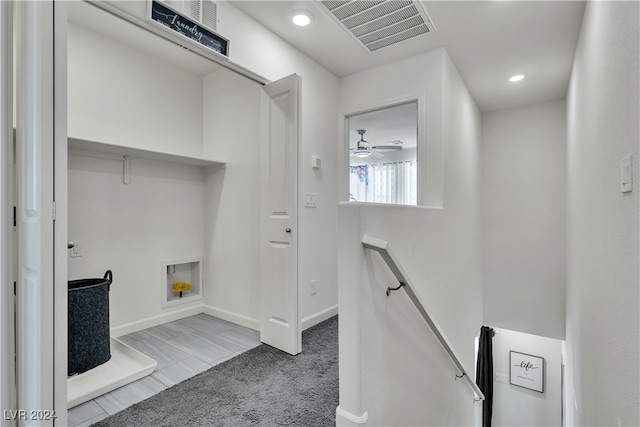 laundry area featuring hookup for a washing machine, light colored carpet, and ceiling fan