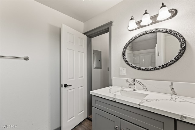 bathroom featuring vanity and wood-type flooring