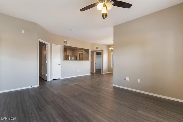 empty room featuring dark hardwood / wood-style flooring and ceiling fan