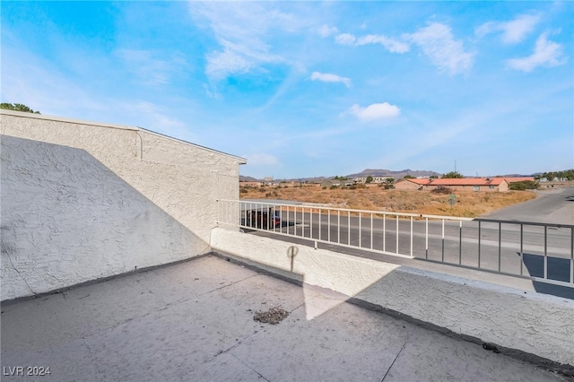 view of patio with a balcony