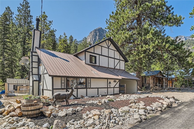 view of home's exterior featuring a mountain view