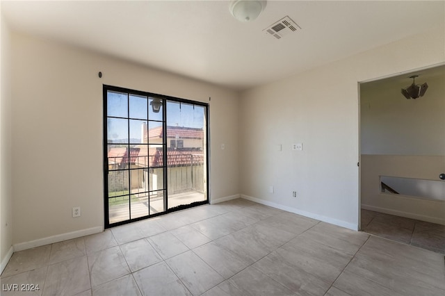 view of tiled empty room