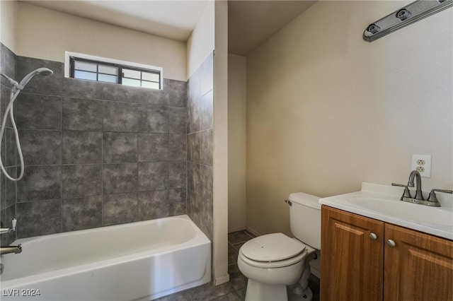 full bathroom with vanity, toilet, tile patterned floors, and tiled shower / bath