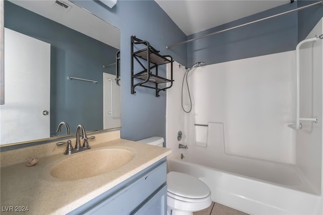 full bathroom featuring toilet, shower / bathing tub combination, vanity, and tile patterned flooring