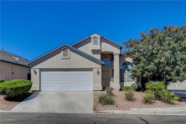 ranch-style house with a garage