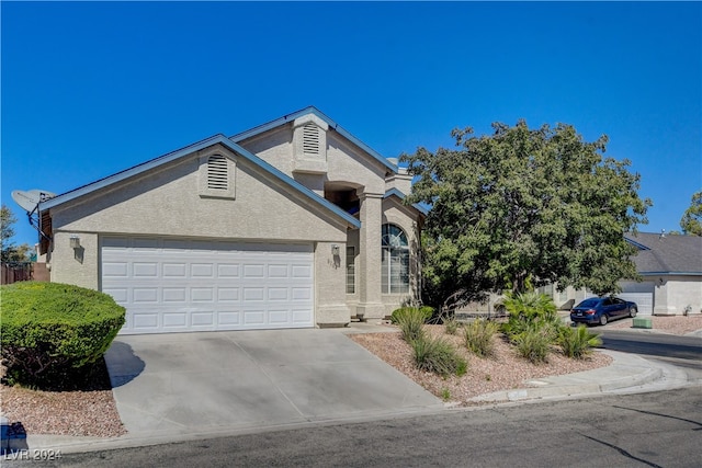 view of front of house with a garage