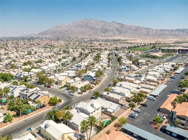 drone / aerial view featuring a mountain view