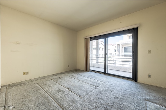 empty room with carpet flooring