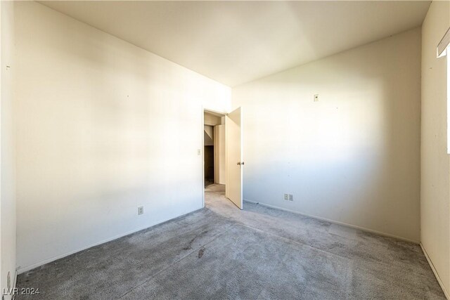 spare room with carpet flooring