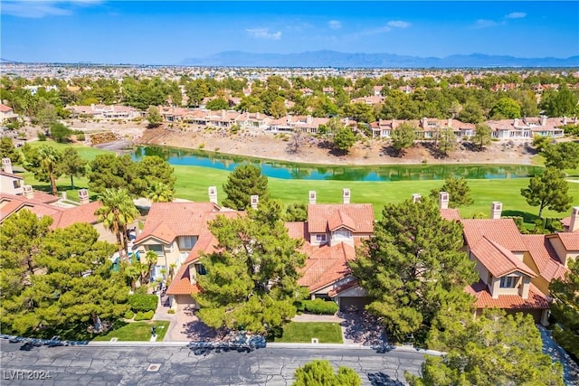 bird's eye view featuring a water and mountain view